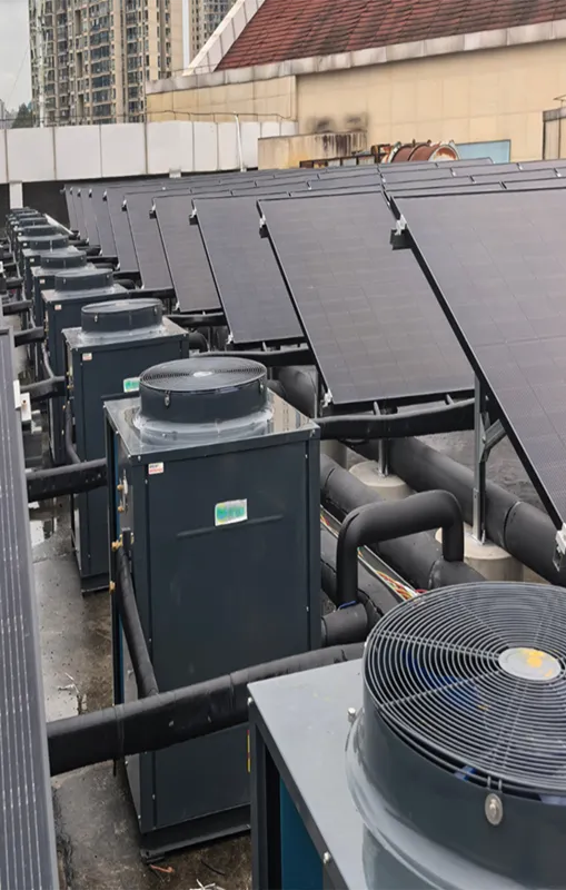 Solis direct expansion PVT collectors connected to a refrigerant-based heat pump system for residential heating and domestic hot water production.