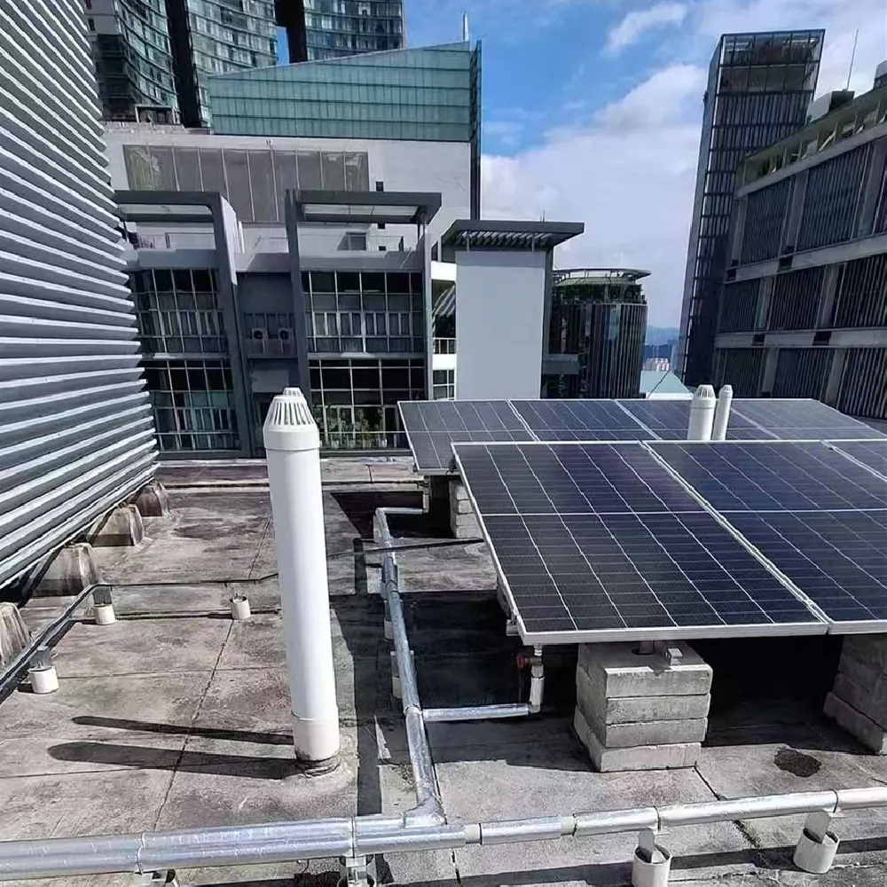 Brine-to-water PVT heat pump system installed on a high-rise residential building rooftop, supporting central hot water and heating