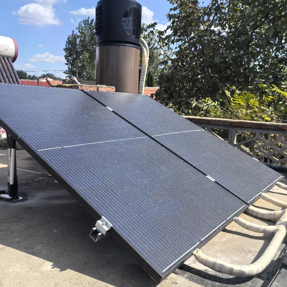 2-panel PVT collector array on a residential rooftop, operating as the evaporator source for a brine heat pump system