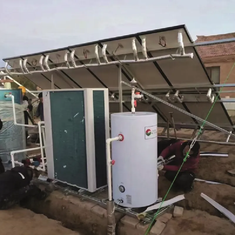 12-panel ground-mounted PVT collector array integrated with a geothermal heat pump system