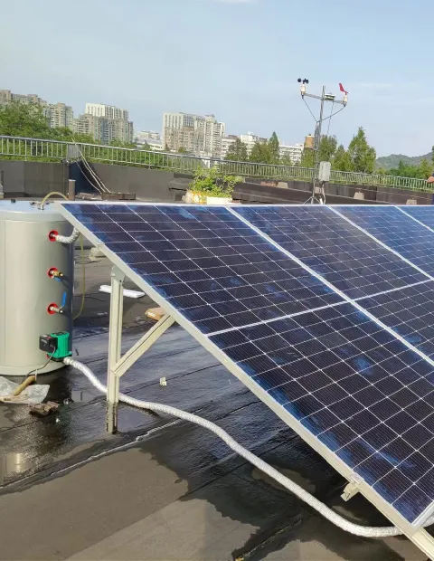 10-panel PVT array on a residential pitched rooftop, producing domestic hot water and electricity as a solar thermal replacement